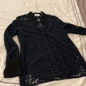Beautiful Navy lace shirt with black collar and cuffs. Fits like an 8-10